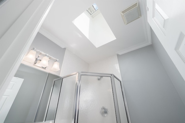 78 Madison St Unit 2, Hoboken, NJ 07030 - bathroom view of a shower stall, ornamental molding, and a skylight