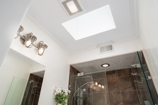 78 Madison St Unit 2, Hoboken, NJ 07030 - bathroom view of tiled shower, crown molding, and a skylight