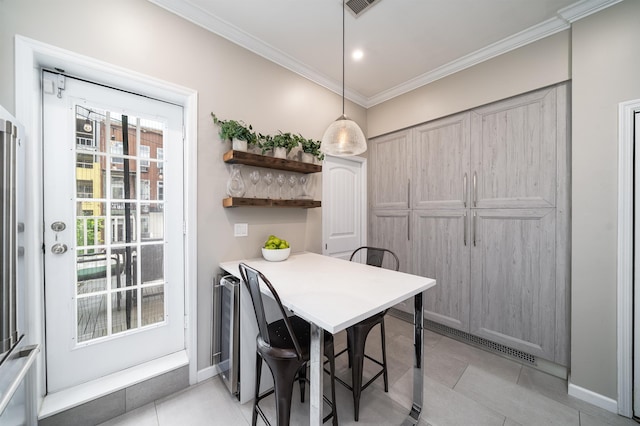 78 Madison St Unit 2, Hoboken, NJ 07030 - dining space with crown molding and light tile patterned floors