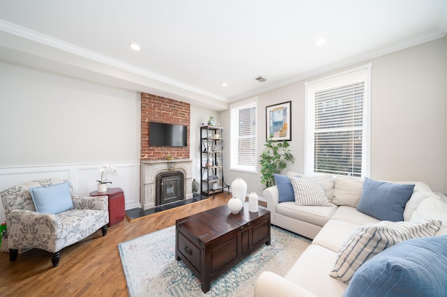 78 Madison St Unit 2, Hoboken, NJ 07030 - living area featuring ornamental molding, light wood-style flooring, recessed lighting, and a fireplace