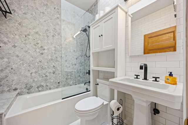 138 Kensington Ave Unit 3, Jersey City, NJ 07304 - bathroom with shower / bathing tub combination, backsplash, and toilet