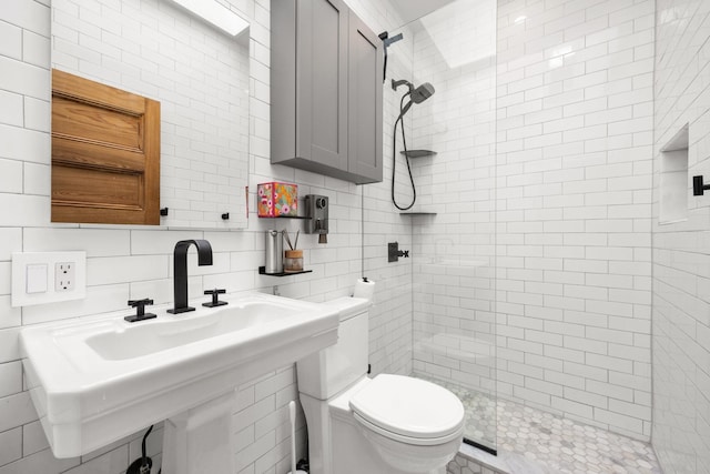 138 Kensington Ave Unit 3, Jersey City, NJ 07304 - full bath featuring backsplash, tile walls, toilet, and tiled shower