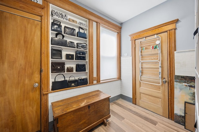 138 Kensington Ave Unit 3, Jersey City, NJ 07304 - entryway featuring a wainscoted wall and light wood-style floors