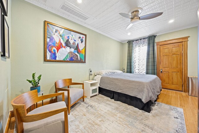 138 Kensington Ave Unit 3, Jersey City, NJ 07304 - bedroom featuring a ceiling fan, light wood-style floors, ornamental molding, visible vents, and recessed lighting
