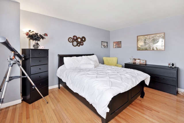 bedroom with light hardwood / wood-style floors