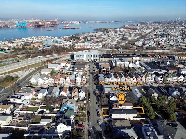 drone / aerial view with a water view