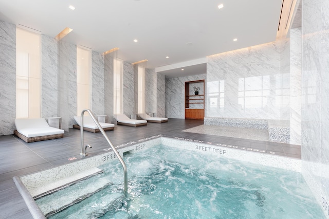 view of pool featuring an indoor in ground hot tub