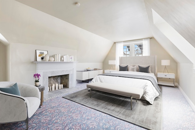 bedroom with lofted ceiling and carpet floors