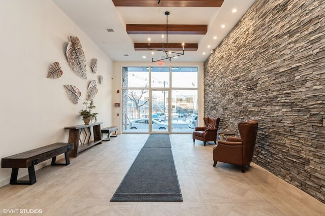 425 3rd St Unit 219, Jersey City, NJ 07302 - building lobby featuring beamed ceiling, recessed lighting, and a high ceiling