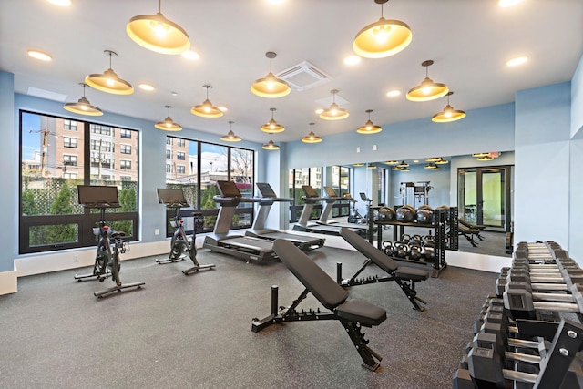 exercise room featuring visible vents and baseboards