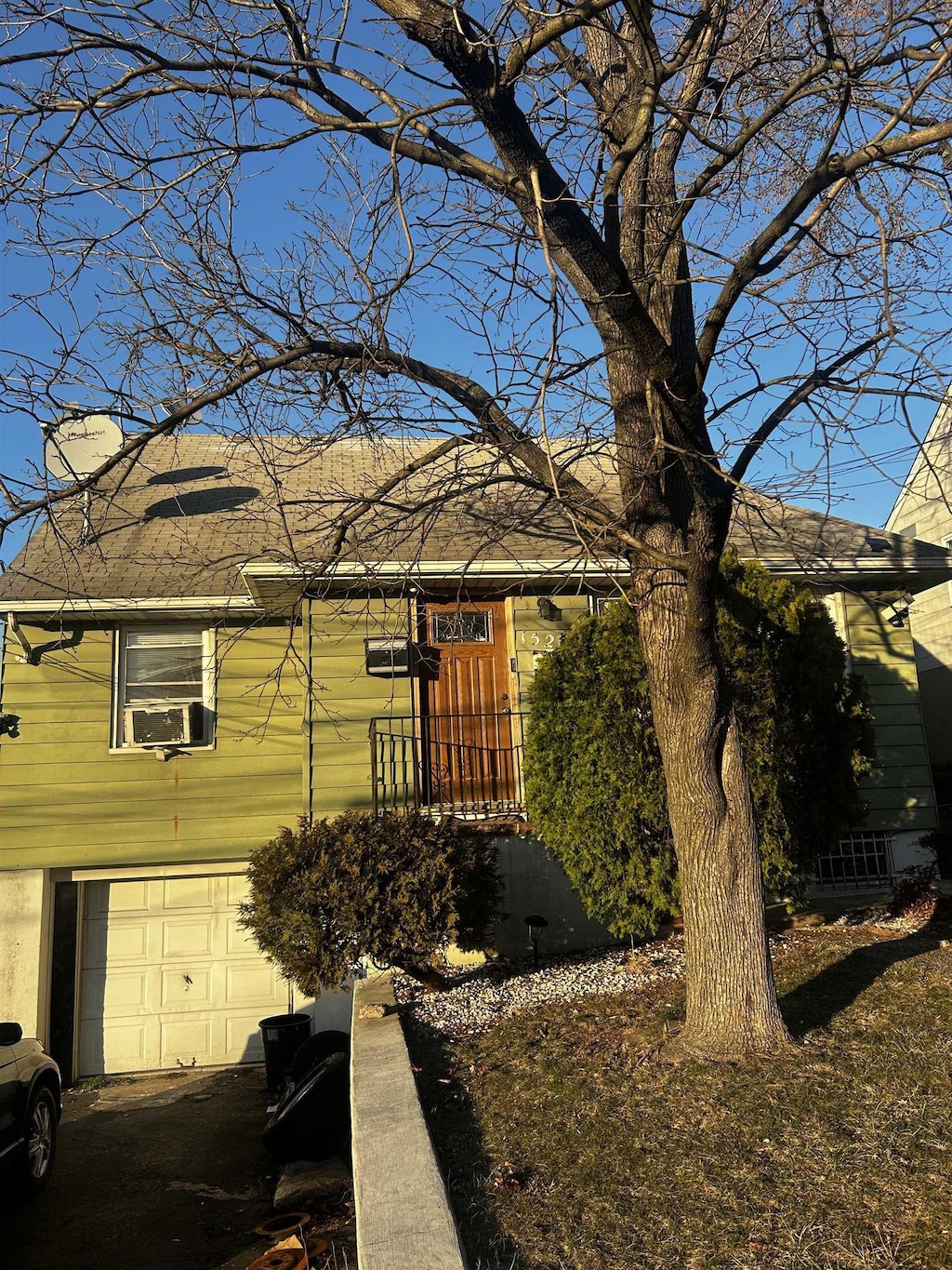 exterior space featuring an attached garage