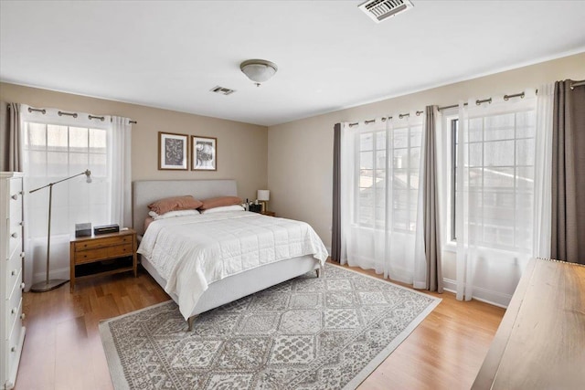 bedroom featuring wood finished floors