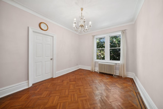 empty room featuring radiator heating unit, ornamental molding, a notable chandelier, and parquet flooring