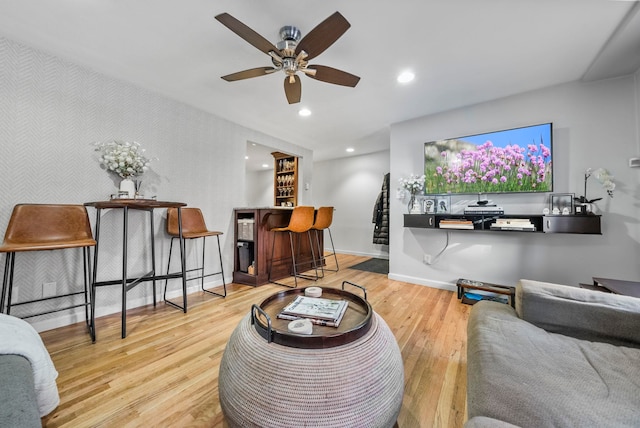 607 1st St Unit 1, Hoboken, NJ 07030 - living area with a ceiling fan, wood finished floors, baseboards, recessed lighting, and a bar