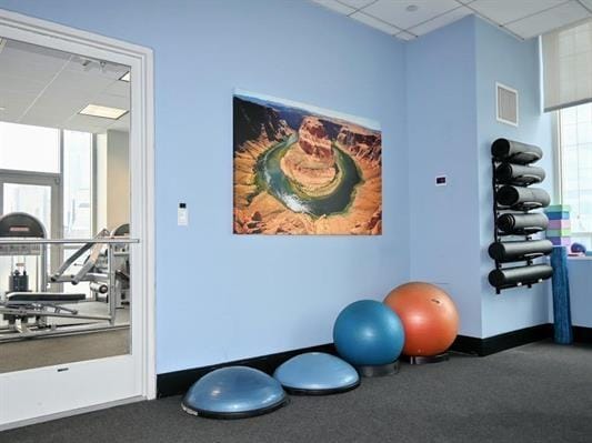 2 2nd St Unit 3103, Jersey City, NJ 07302 - workout area with a drop ceiling and carpet