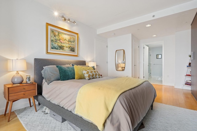 2 2nd St Unit 3103, Jersey City, NJ 07302 - bedroom with light wood-type flooring, recessed lighting, and baseboards