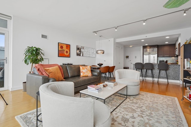 2 2nd St Unit 3103, Jersey City, NJ 07302 - living room featuring track lighting, light wood-type flooring, and recessed lighting