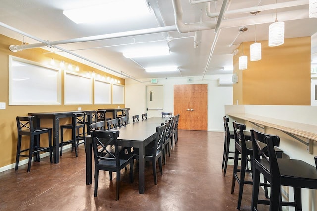 10 Huron Ave Unit 17F, Jersey City, NJ 07306 - dining area featuring concrete floors and baseboards