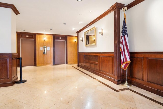 10 Huron Ave Unit 17F, Jersey City, NJ 07306 - lobby with ornamental molding, a wainscoted wall, recessed lighting, and wooden walls