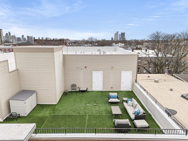 exterior space featuring a lawn and outdoor lounge area