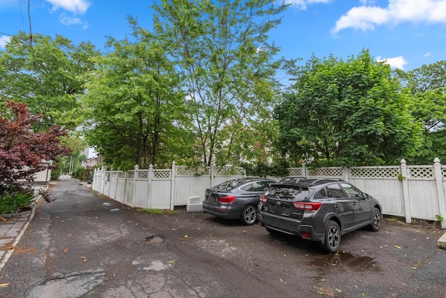 1208 River Rd, Edgewater, NJ 07020 - view of parking featuring fence