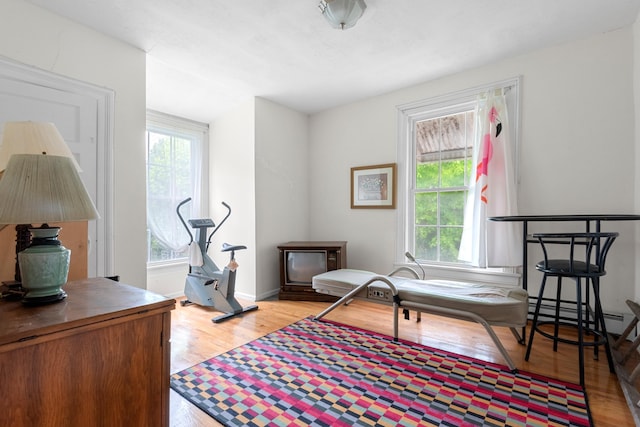 1208 River Rd, Edgewater, NJ 07020 - sitting room featuring light wood-type flooring, baseboards, and a baseboard heating unit