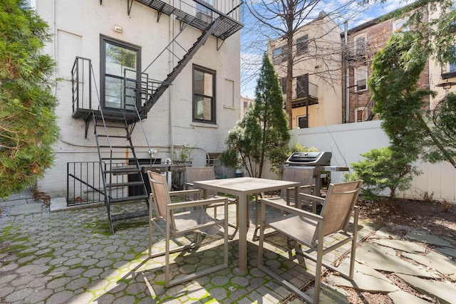 109 Erie St Unit 4L, Jersey City, NJ 07302 - view of patio with outdoor dining area and entry steps