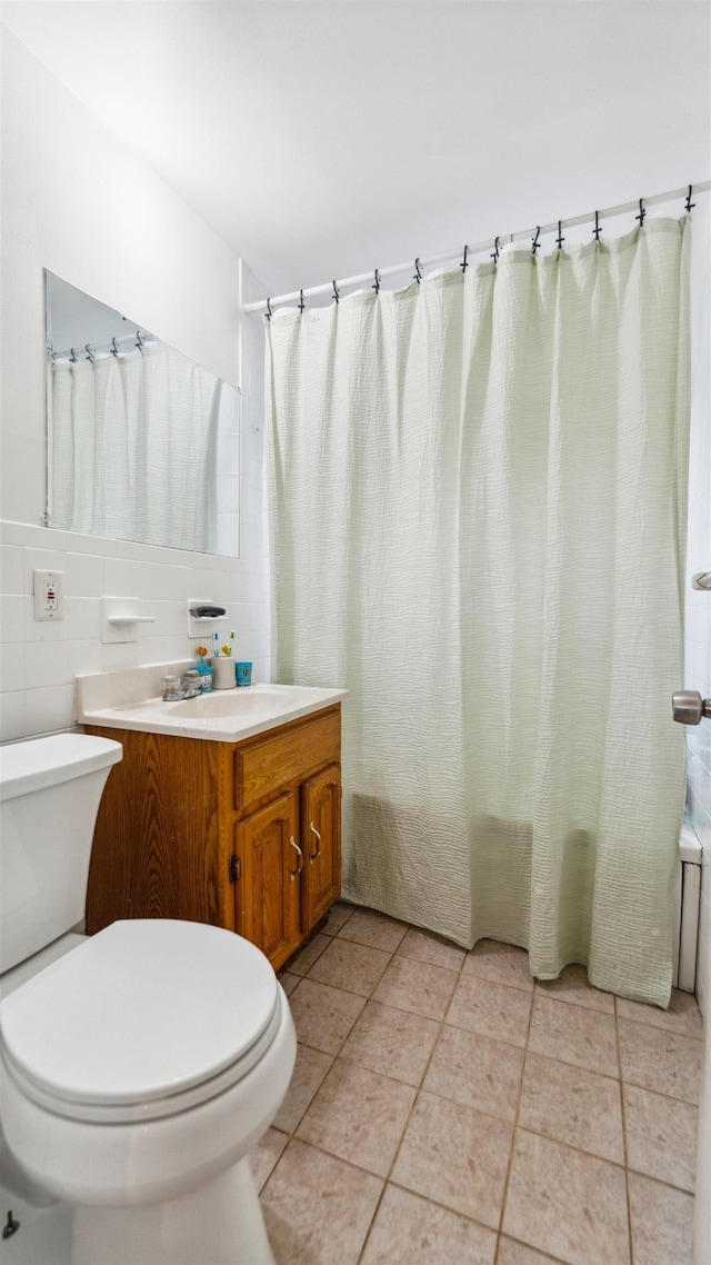 149 Hickory St, Kearny, NJ 07032 - bathroom featuring vanity, tile patterned flooring, and shower / bath combination with curtain