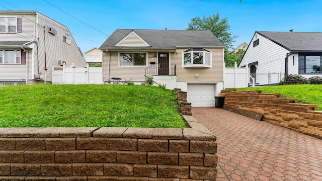 149 Hickory St, Kearny, NJ 07032 - view of front facade featuring driveway and a garage