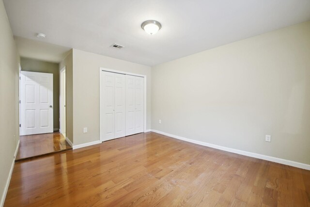 1160 Summit Ave Unit 2, Jersey City, NJ 07307 - unfurnished bedroom featuring light wood-style floors and a closet