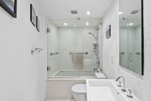 300 Newark St Unit 8G, Hoboken, NJ 07030 - full bathroom featuring toilet, tiled shower / bath, recessed lighting, and vanity