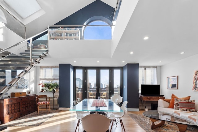 300 Newark St Unit 8G, Hoboken, NJ 07030 - dining room featuring wood finished floors, recessed lighting, stairs, french doors, and baseboards