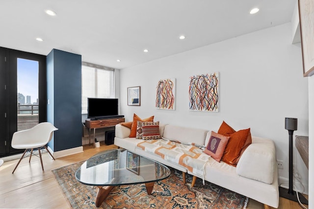 300 Newark St Unit 8G, Hoboken, NJ 07030 - living room with recessed lighting and light wood-style flooring