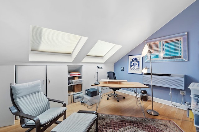 300 Newark St Unit 8G, Hoboken, NJ 07030 - office space with a skylight, wood finished floors, and vaulted ceiling