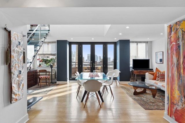 300 Newark St Unit 8G, Hoboken, NJ 07030 - dining area with hardwood / wood-style floors, recessed lighting, baseboards, and french doors