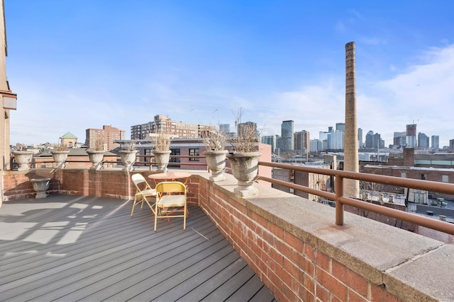 300 Newark St Unit 8G, Hoboken, NJ 07030 - wooden terrace with a skyline view