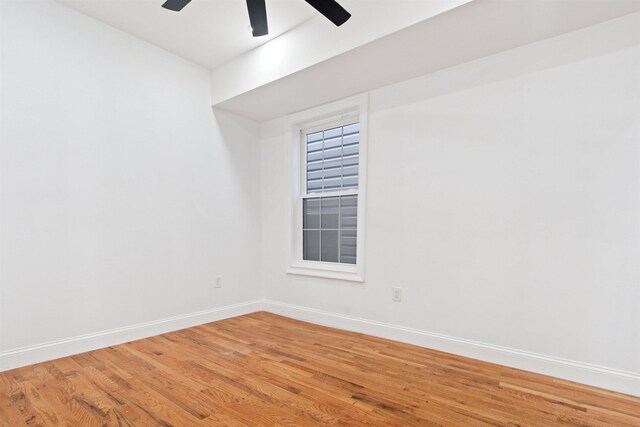 133 W 4th St, Bayonne, NJ 07002 - empty room featuring ceiling fan and light wood-style floors