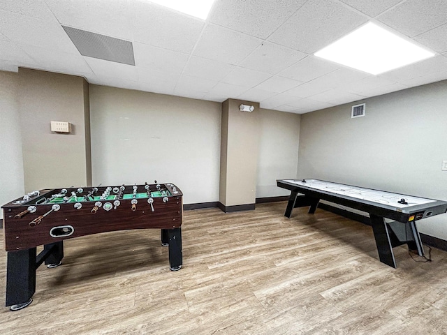 Harmon Cove Tower 426, Secaucus, NJ 07094 - rec room featuring wood finished floors, baseboards, and a paneled ceiling