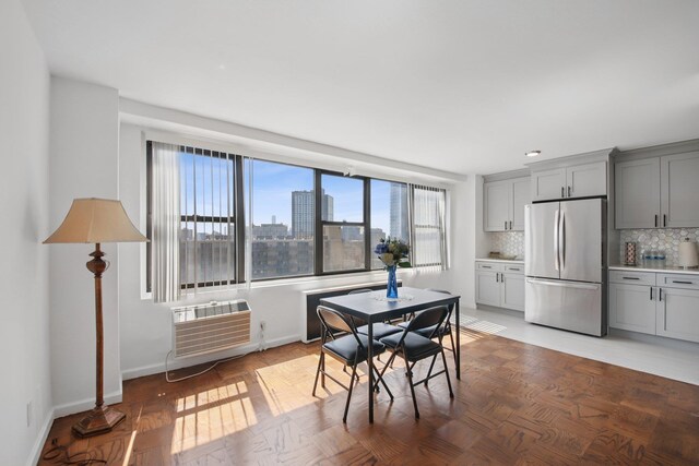 10 Huron Ave Unit 11D, Jersey City, NJ 07306 - dining room with plenty of natural light and a wall mounted air conditioner