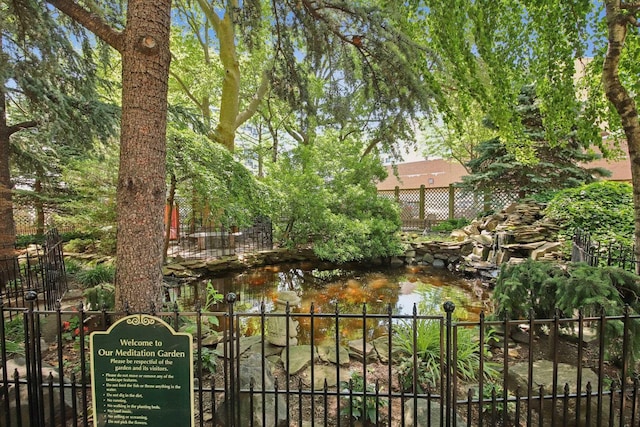 10 Huron Ave Unit 11D, Jersey City, NJ 07306 - view of front facade with a small pond