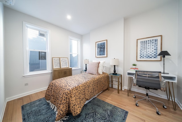 bedroom featuring hardwood / wood-style flooring