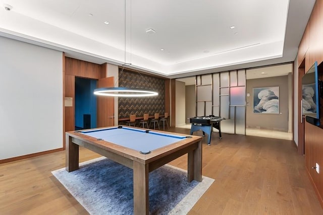 99 Hudson St Unit 601, Jersey City, NJ 07302 - game room with a tray ceiling, billiards, light wood finished floors, and baseboards