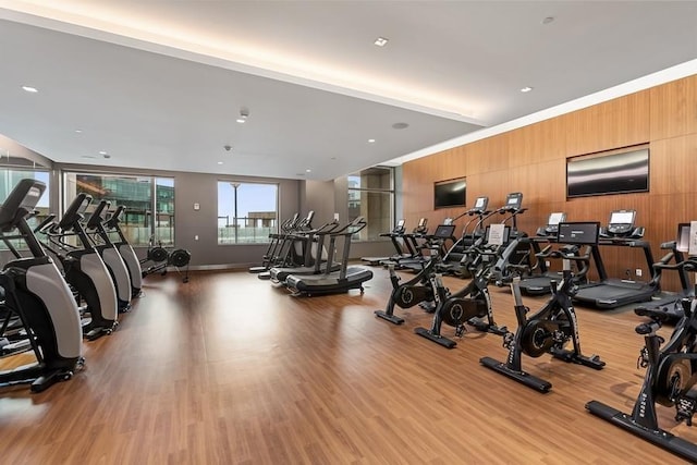 99 Hudson St Unit 601, Jersey City, NJ 07302 - exercise room with wooden walls and light wood finished floors