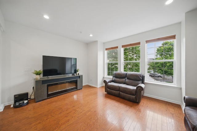 28 Creekside Ct Unit 28, Secaucus, NJ 07094 - living area with wood finished floors, baseboards, and recessed lighting