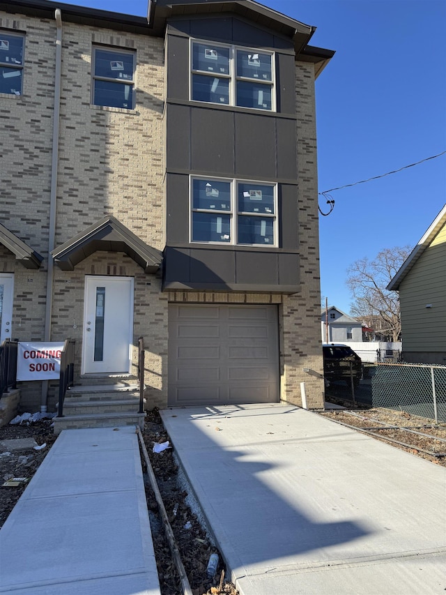 view of front of property featuring a garage