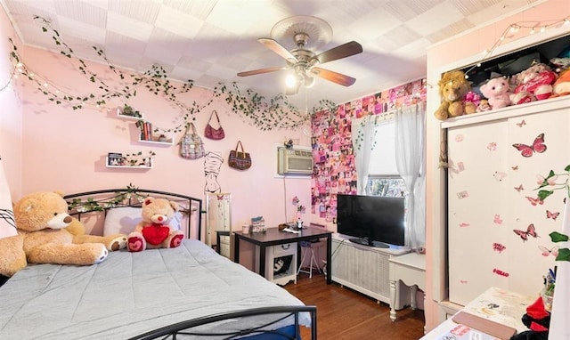 bedroom featuring dark wood-type flooring and ceiling fan