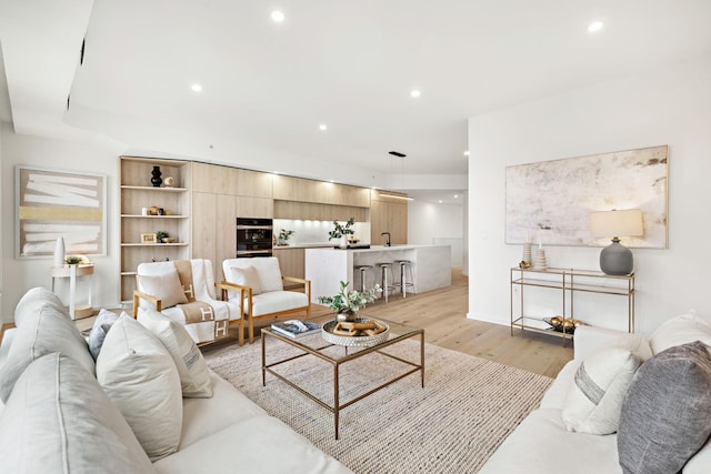 413 Monroe St Unit 200, Hoboken, NJ 07030 - living area featuring light wood finished floors, recessed lighting, and baseboards