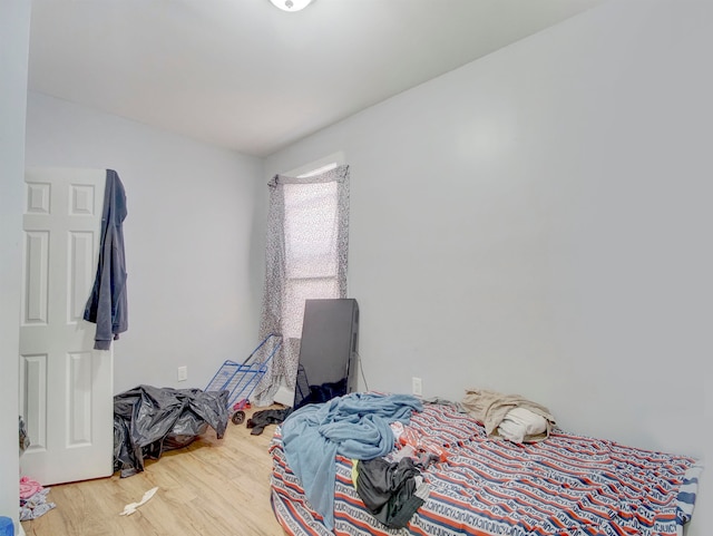 bedroom featuring hardwood / wood-style floors