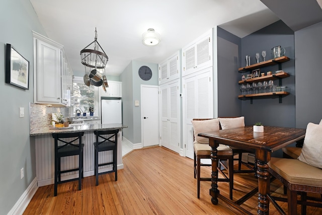 127 Park Ave Unit 2, Hoboken, NJ 07030 - dining area featuring light wood finished floors and baseboards