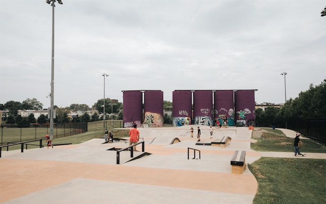 view of property's community featuring fence